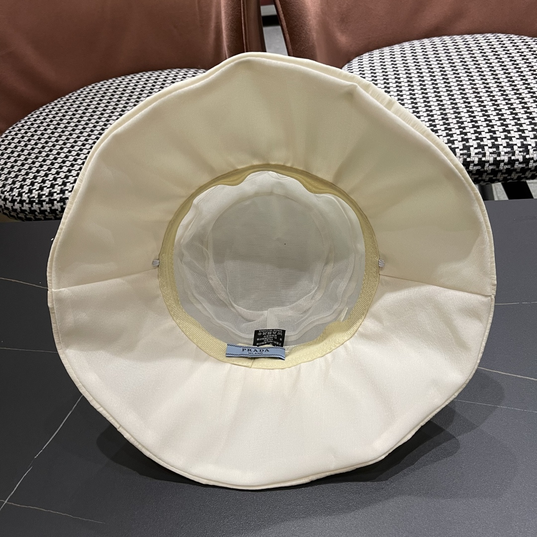  Prada普拉达 2025新款春夏季新款蝴蝶结大沿盆帽女户外出游时尚百
搭渔夫帽休闲旅游帽子