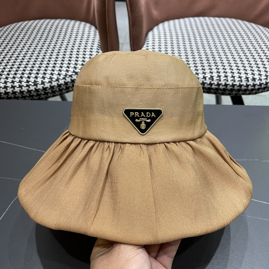  Prada普拉达 2025新款春夏季新款蝴蝶结大沿盆帽女户外出游时尚百
搭渔夫帽休闲旅游帽子