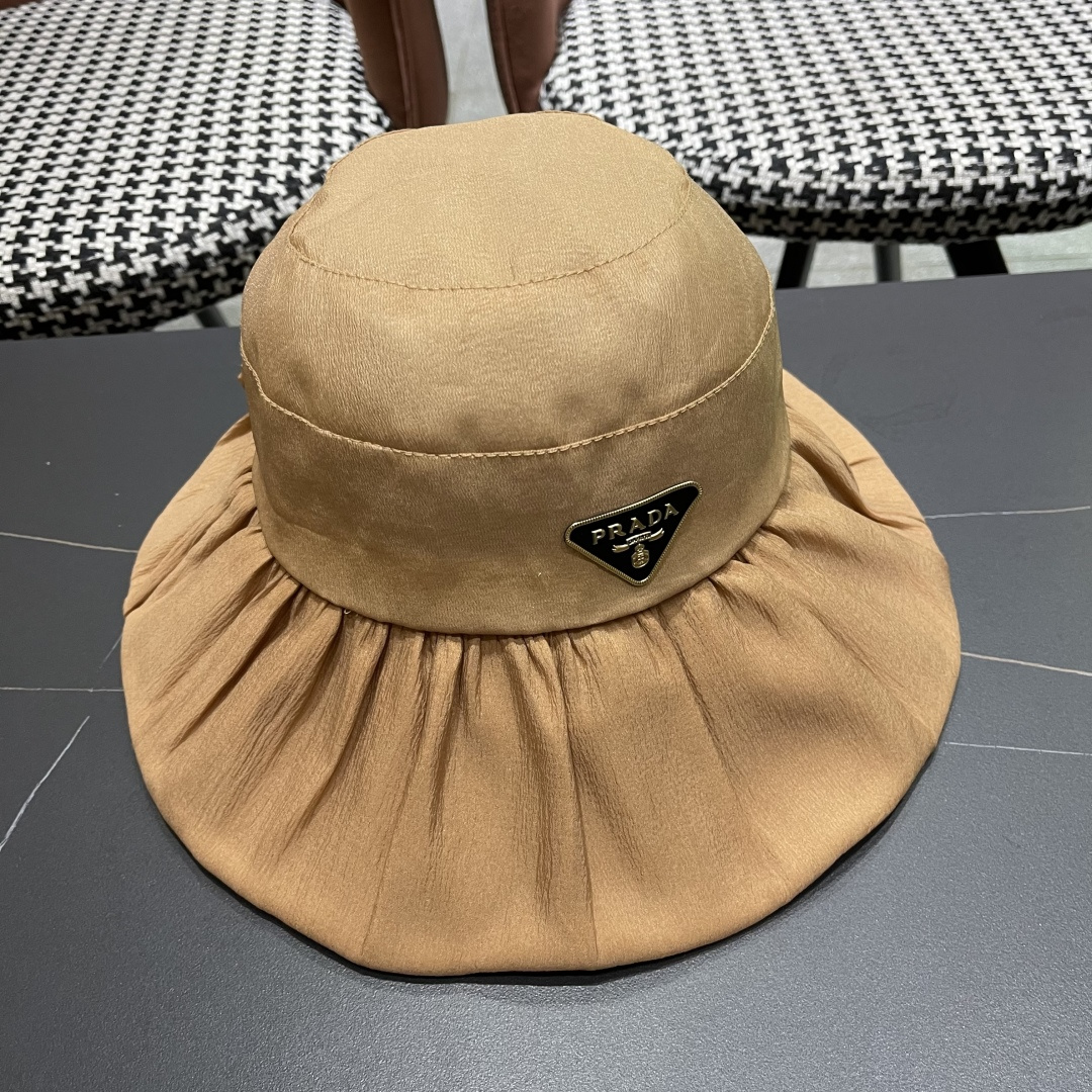  Prada普拉达 2025新款春夏季新款蝴蝶结大沿盆帽女户外出游时尚百
搭渔夫帽休闲旅游帽子