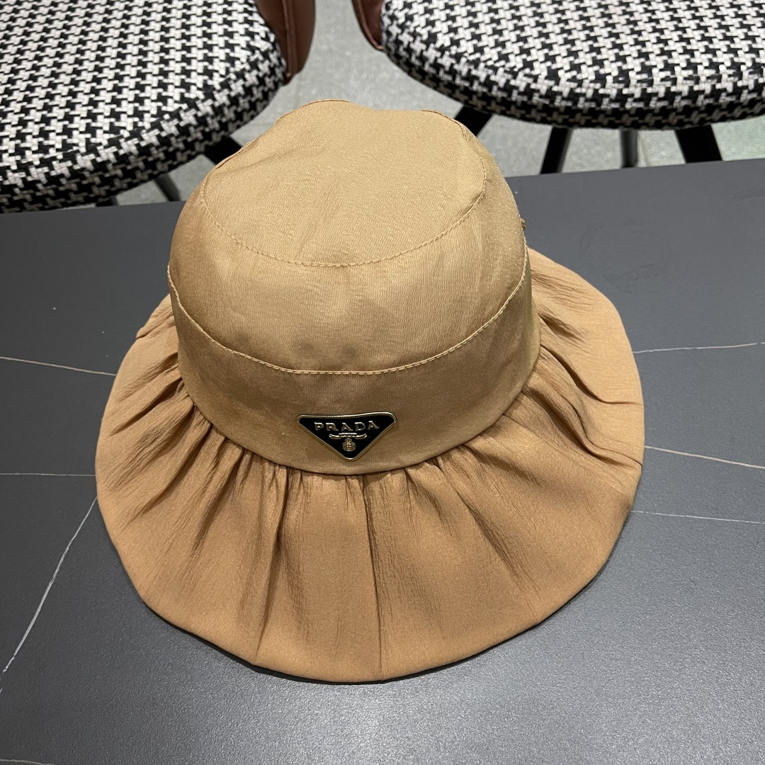  Prada普拉达 2025新款春夏季新款蝴蝶结大沿盆帽女户外出游时尚百
搭渔夫帽休闲旅游帽子