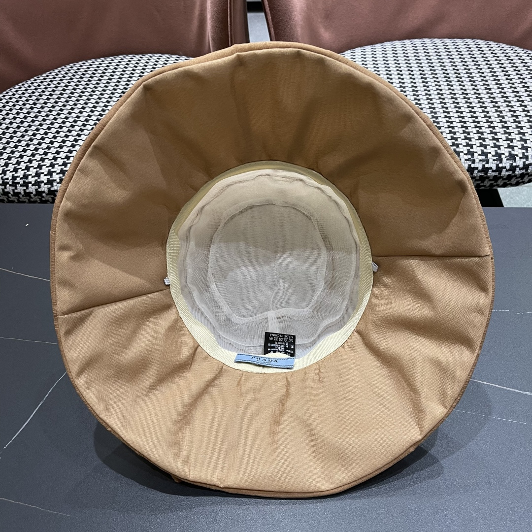  Prada普拉达 2025新款春夏季新款蝴蝶结大沿盆帽女户外出游时尚百
搭渔夫帽休闲旅游帽子