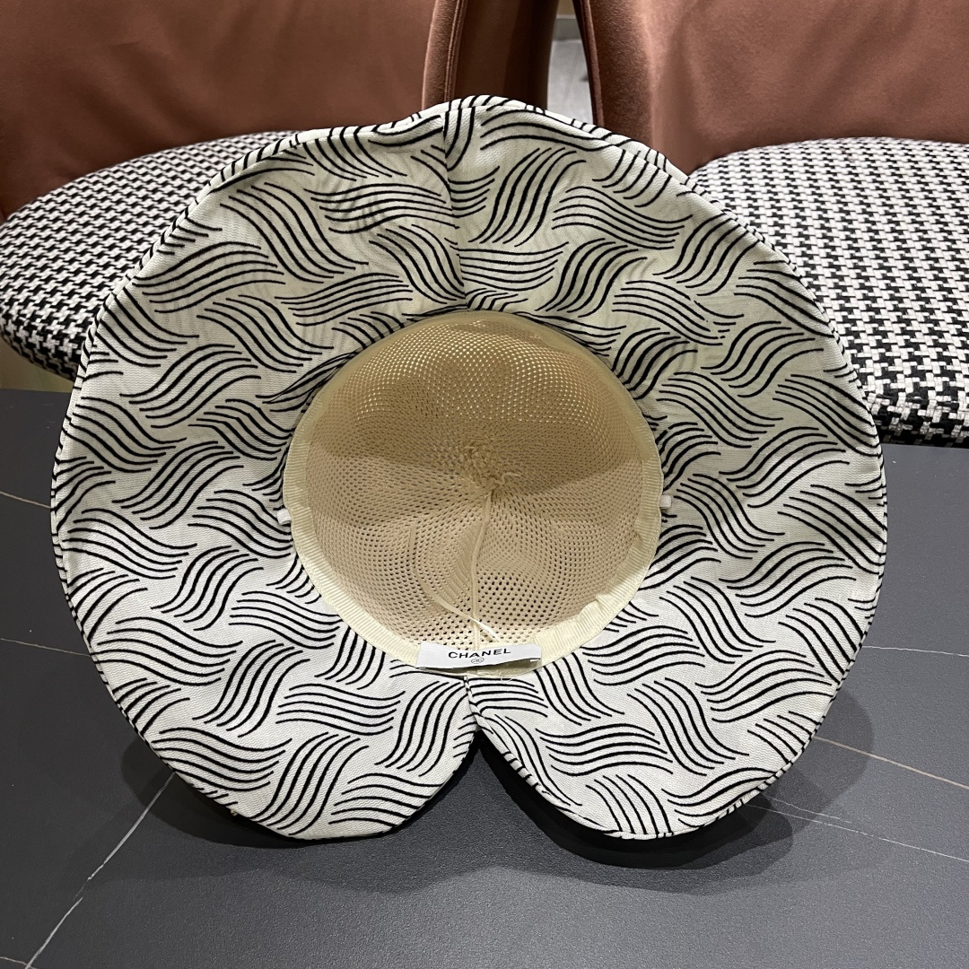 香奈儿Chanel新款夏季女防紫外线渔夫帽户外遮脸太阳帽字母镂空帽出游沙滩防晒