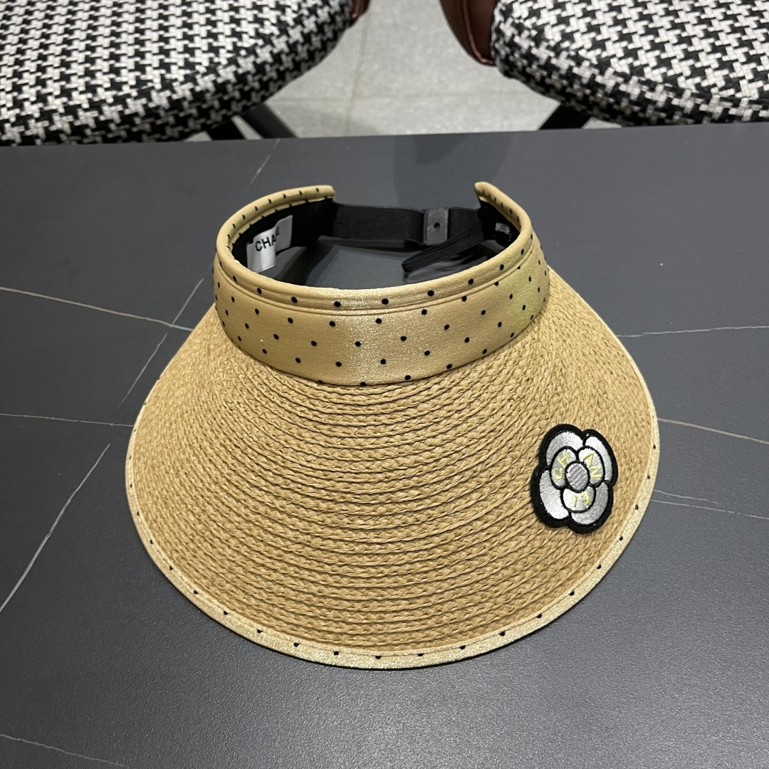  香奈儿CHANEL 新款法式波点大檐品脸小遮阳草编空顶帽女春夏防
晒潮时尚休闲 01