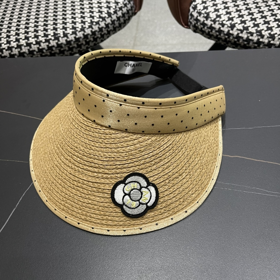  香奈儿CHANEL 新款法式波点大檐品脸小遮阳草编空顶帽女春夏防
晒潮时尚休闲 01
