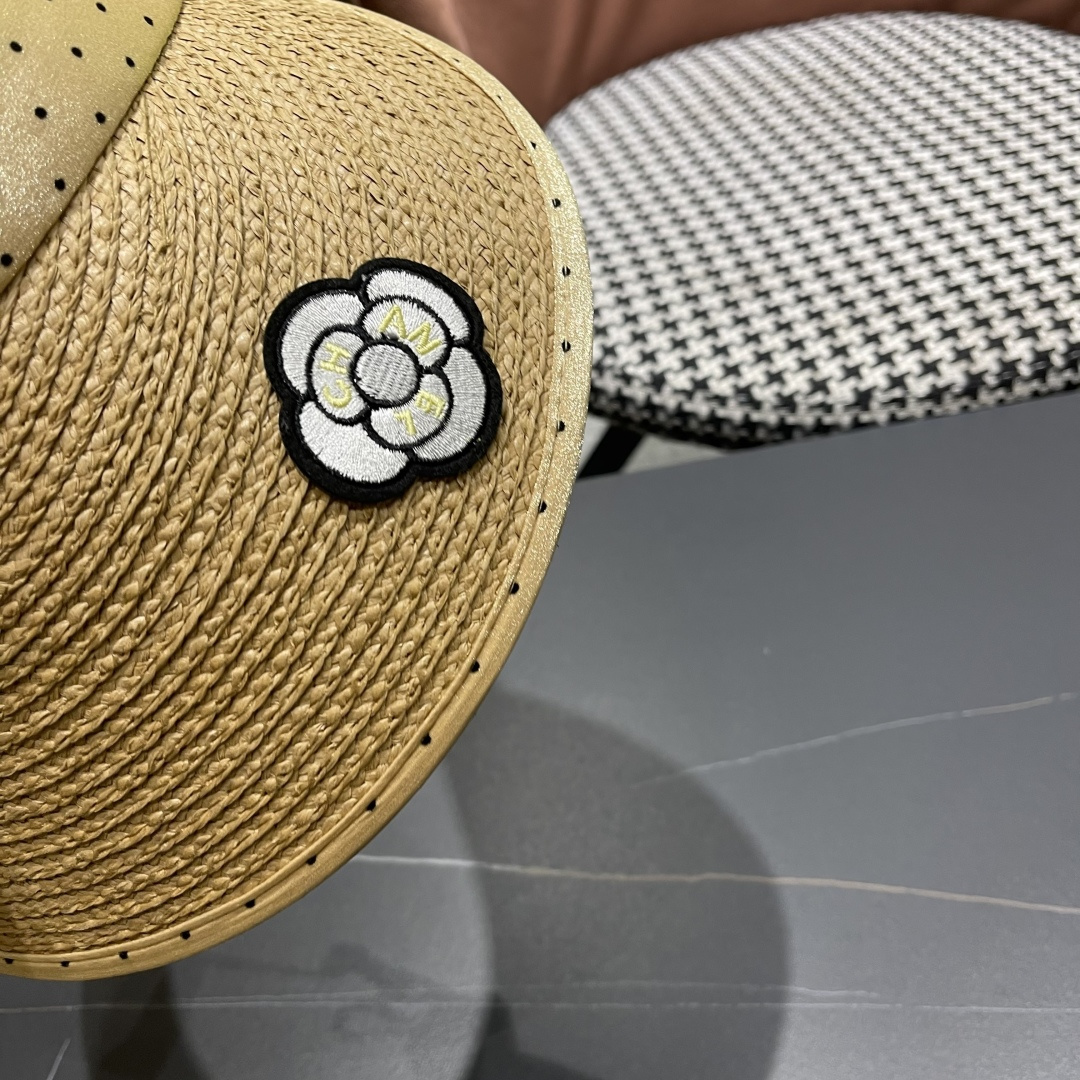  香奈儿CHANEL 新款法式波点大檐品脸小遮阳草编空顶帽女春夏防
晒潮时尚休闲 01