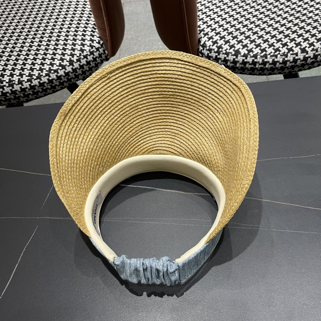  香奈儿CHANEL 2025新款蝴蝶结草编空顶帽女夏出游大
檐防紫外线遮阳太阳帽显脸小