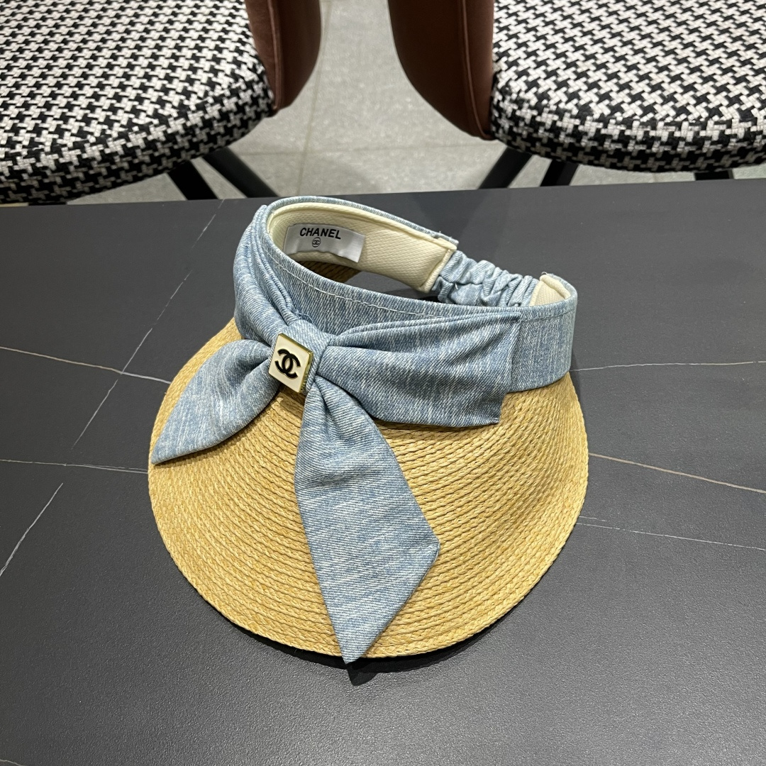  香奈儿CHANEL 2025新款蝴蝶结草编空顶帽女夏出游大
檐防紫外线遮阳太阳帽显脸小