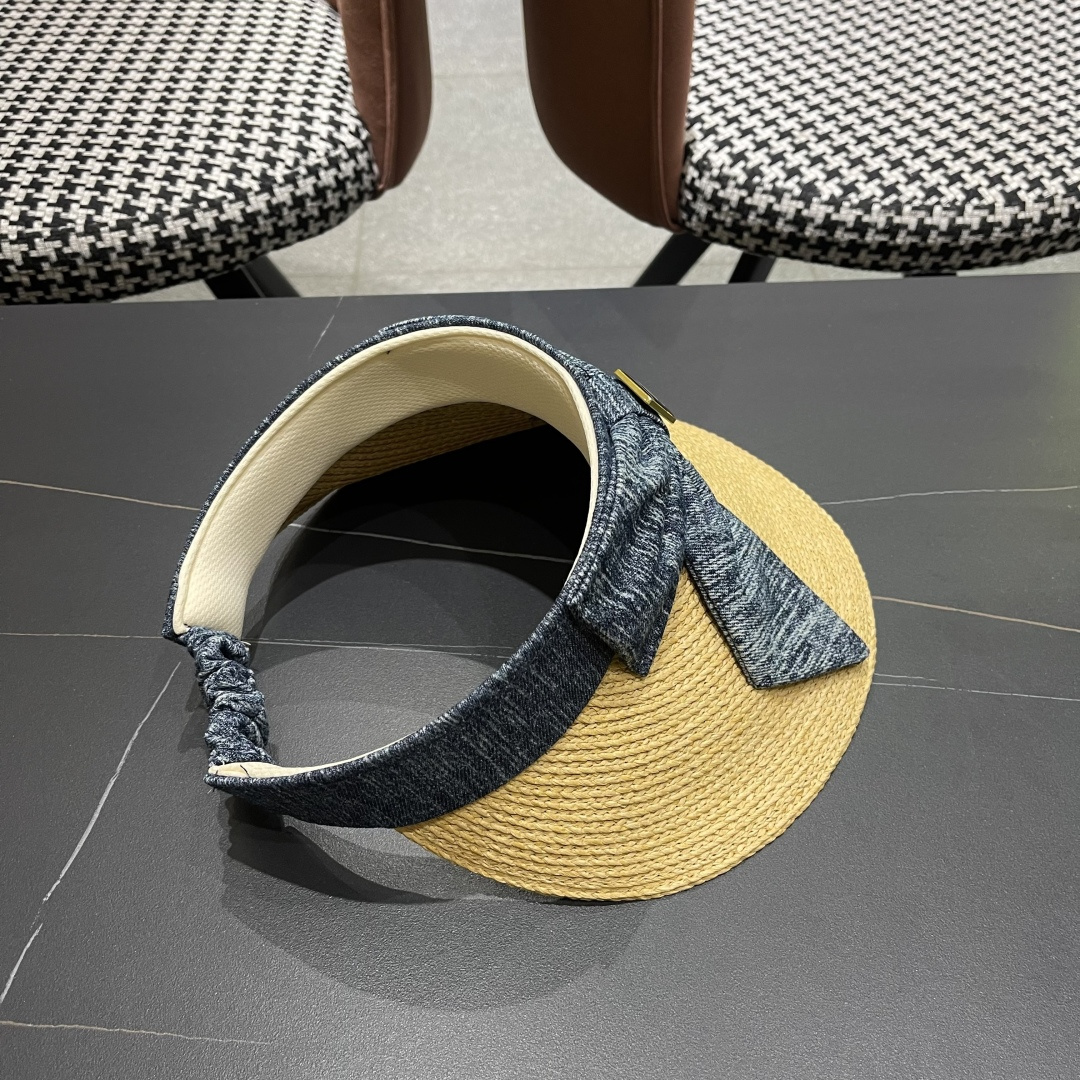  香奈儿CHANEL 2025新款蝴蝶结草编空顶帽女夏出游大
檐防紫外线遮阳太阳帽显脸小