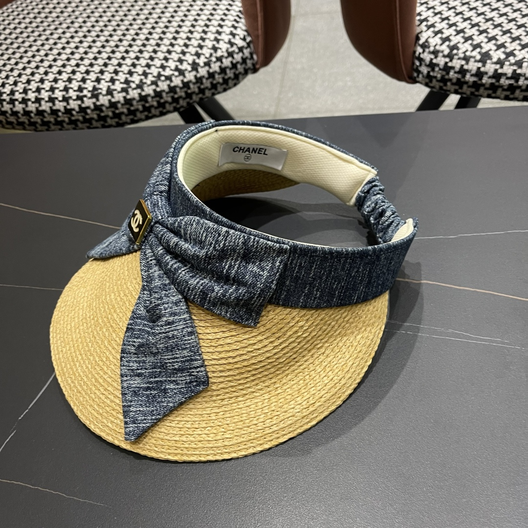  香奈儿CHANEL 2025新款蝴蝶结草编空顶帽女夏出游大
檐防紫外线遮阳太阳帽显脸小