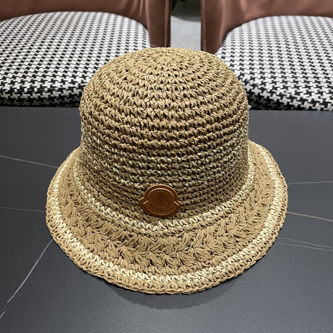  （蒙囗MONCLER海边度假条纹手工编织渔夫帽女夏法式镂空大帽檐遞阳防晒草帽
