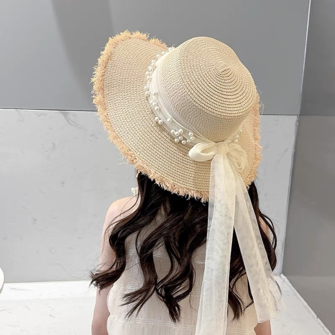  香奈儿Chanel 2025蝴蝶结草编帽子平顶珍珠毛边草帽女大帽檐夏季海
边沙滩遮阳防晒帽