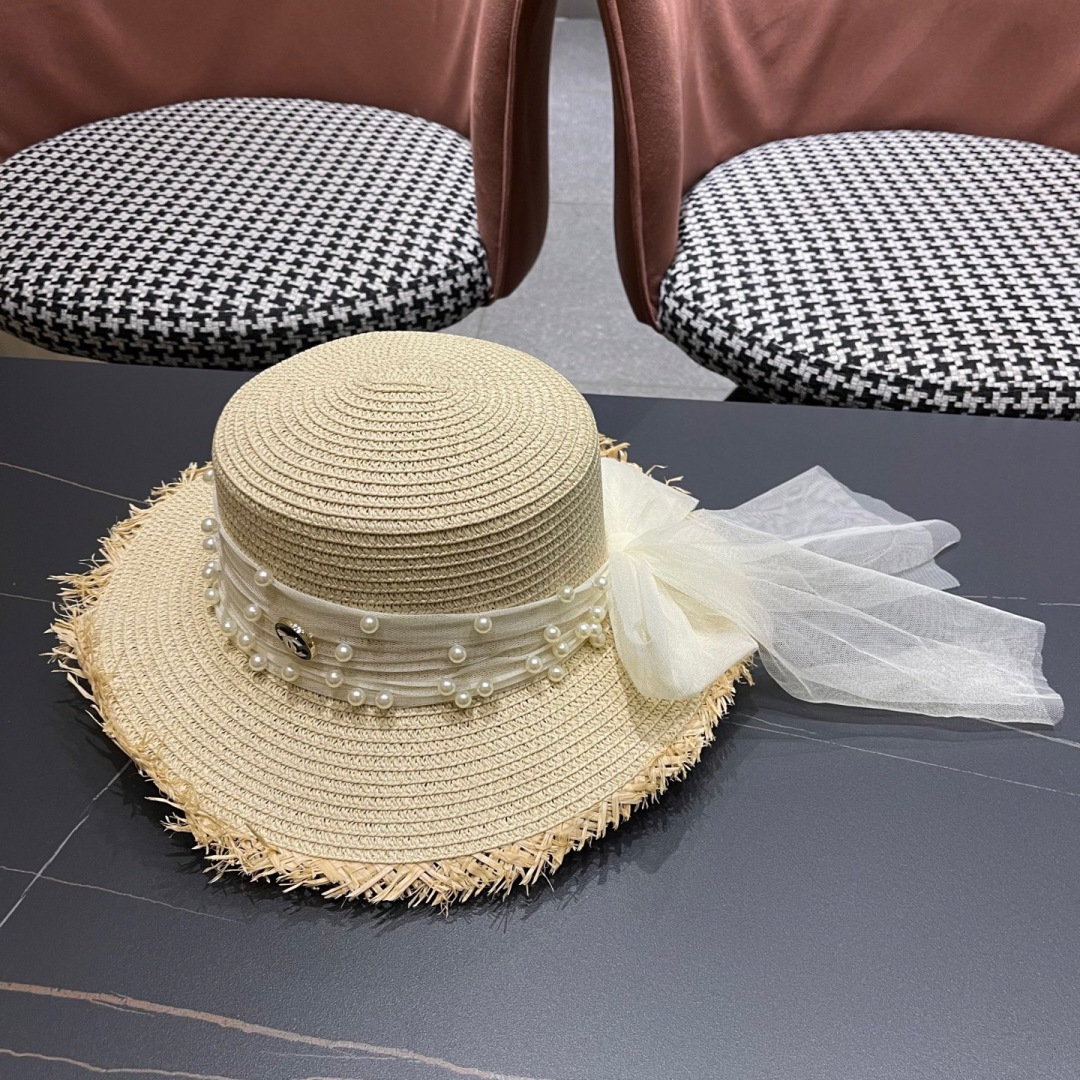  香奈儿Chanel 2025蝴蝶结草编帽子平顶珍珠毛边草帽女大帽檐夏季海
边沙滩遮阳防晒帽