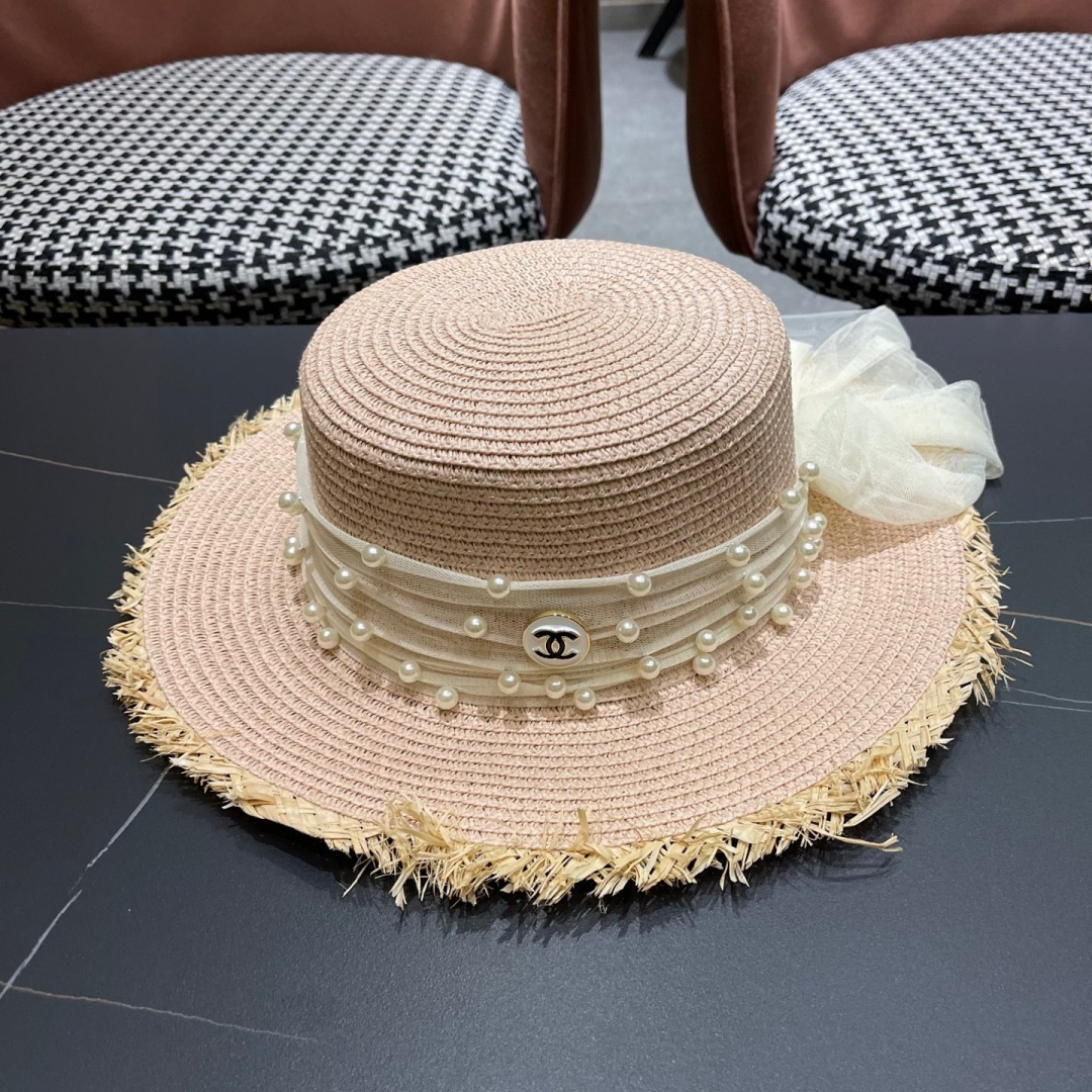  香奈儿Chanel 2025蝴蝶结草编帽子平顶珍珠毛边草帽女大帽檐夏季海
边沙滩遮阳防晒帽