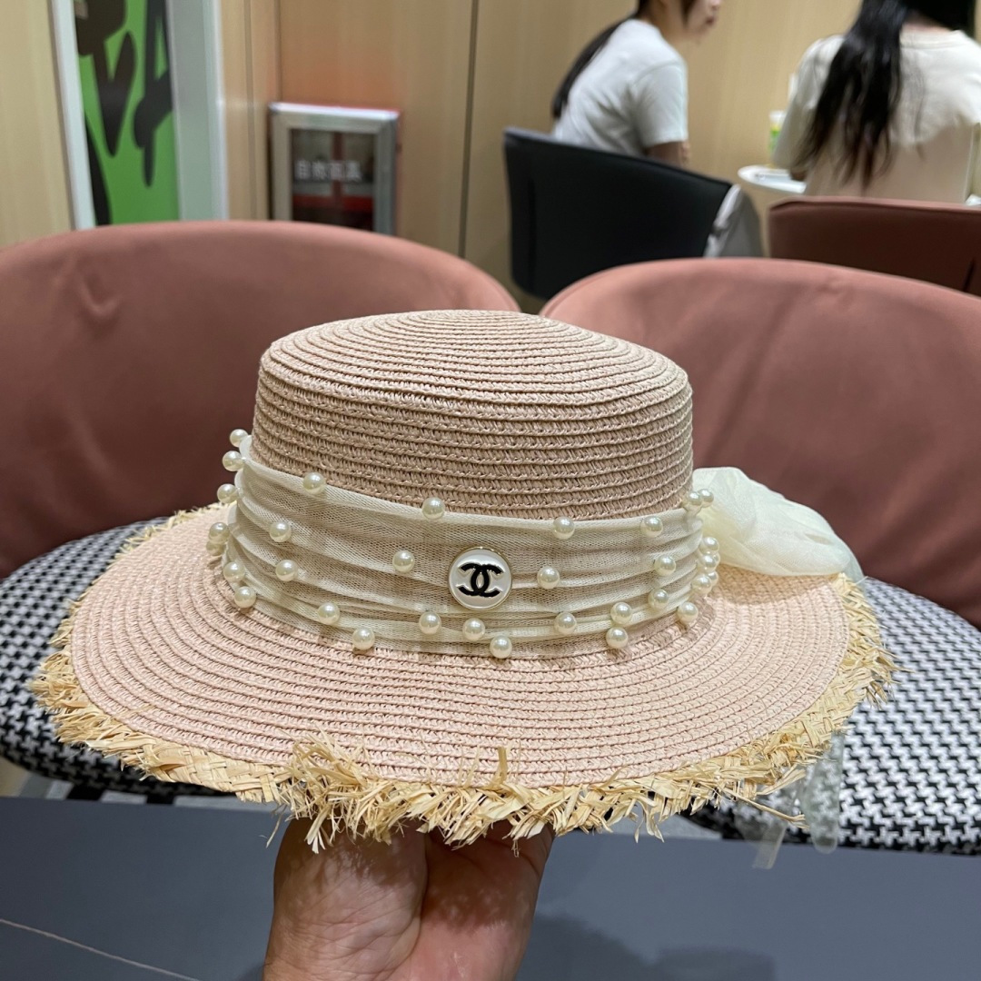  香奈儿Chanel 2025蝴蝶结草编帽子平顶珍珠毛边草帽女大帽檐夏季海
边沙滩遮阳防晒帽