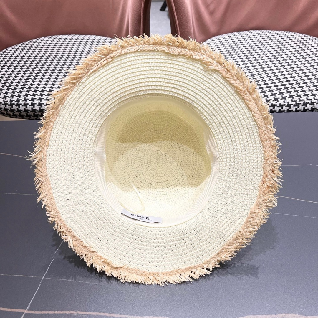 香奈儿Chanel 2025蝴蝶结草编帽子平顶珍珠毛边草帽女大帽檐夏季海
边沙滩遮阳防晒帽
