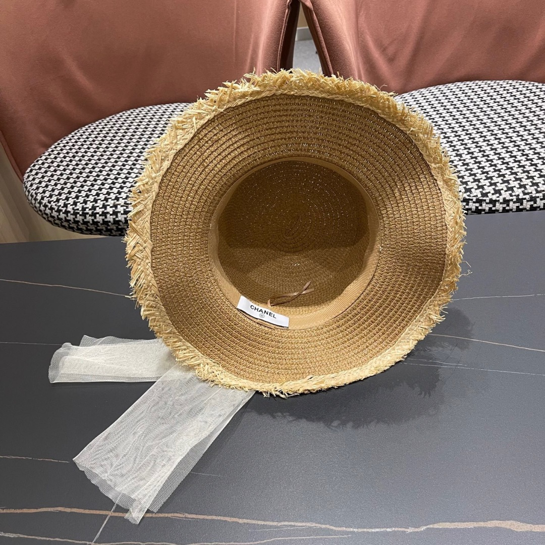  香奈儿Chanel 2025蝴蝶结草编帽子平顶珍珠毛边草帽女大帽檐夏季海
边沙滩遮阳防晒帽