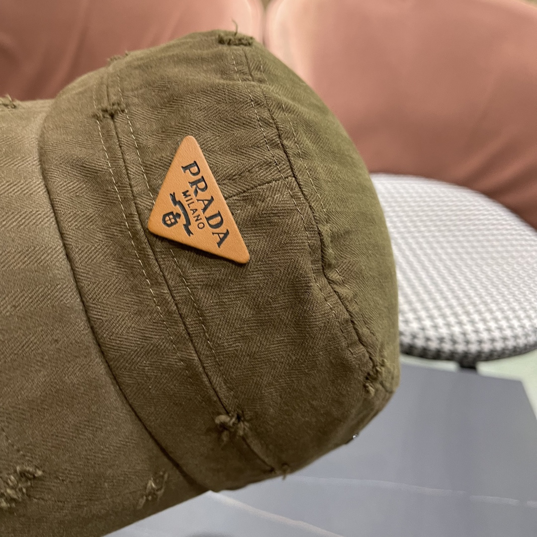  普拉达2025新款闪电小狗森系男女休闲鸭舌帽徒步越
野穿河过隙户外探险平顶防晒