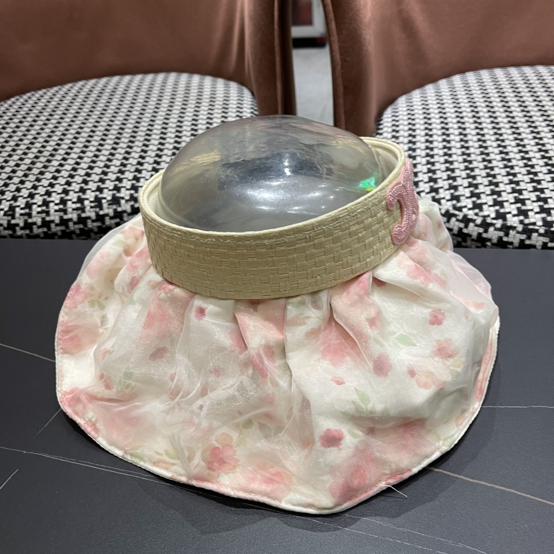  赛琳 夏季新款女花朵出游可收纳发箍贝壳帽空顶防晒
帽百搭遮阳帽沙滩帽