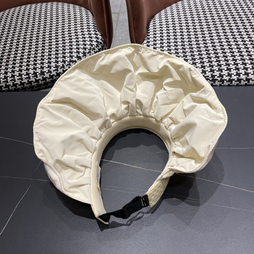  赛琳 夏季新款女花朵出游可收纳发箍贝壳帽空顶防晒
帽百搭遮阳帽沙滩帽