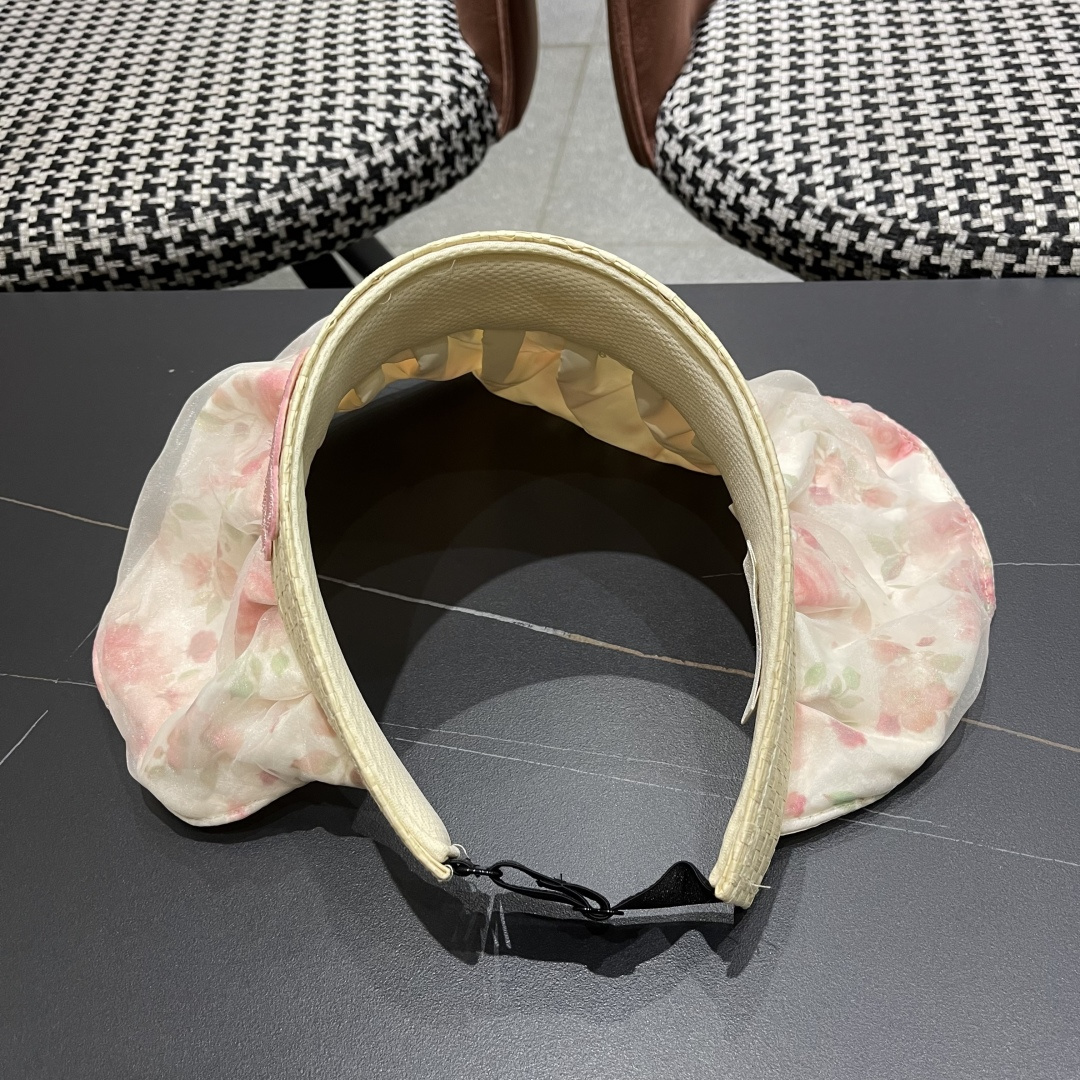  赛琳 夏季新款女花朵出游可收纳发箍贝壳帽空顶防晒
帽百搭遮阳帽沙滩帽