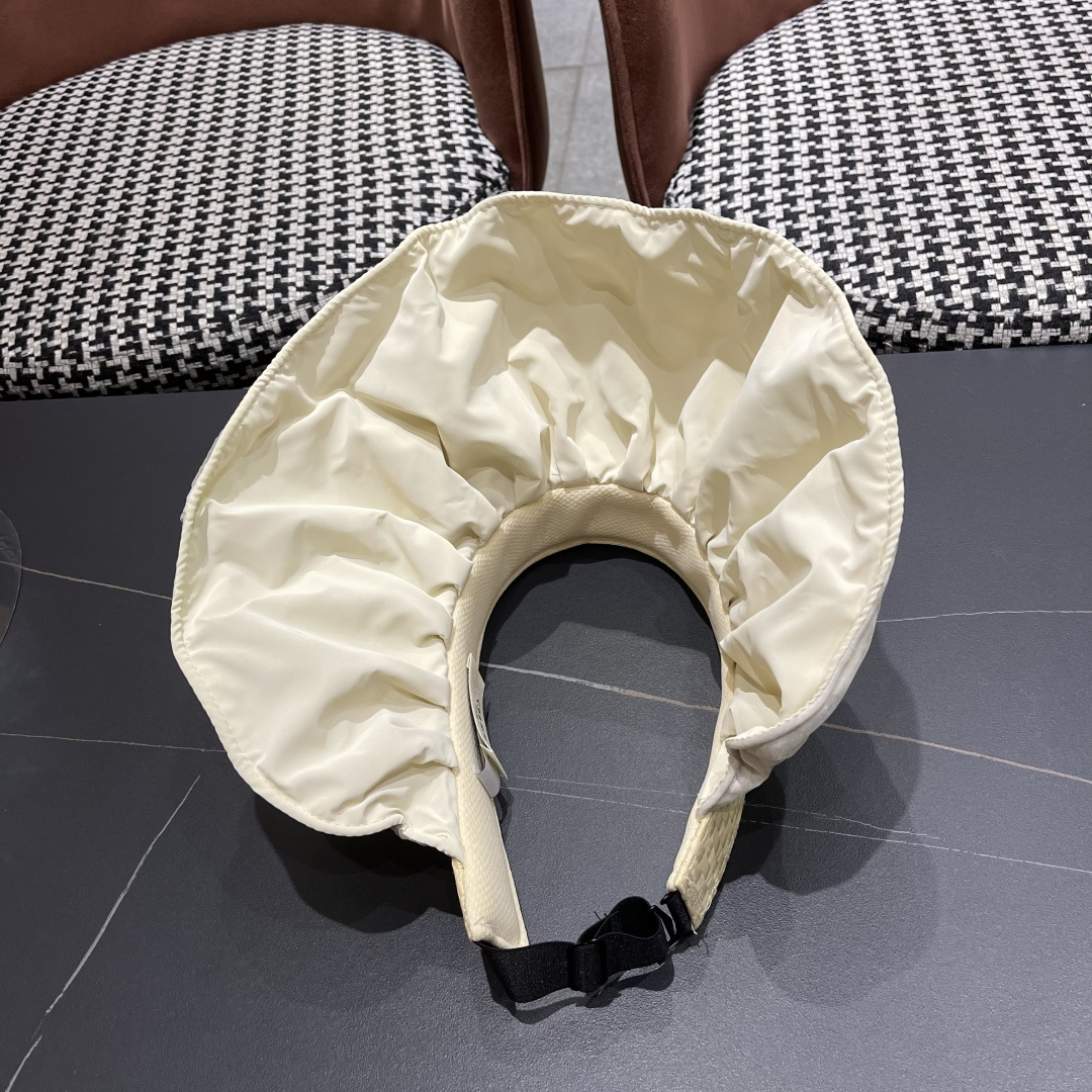  赛琳 夏季新款女花朵出游可收纳发箍贝壳帽空顶防晒
帽百搭遮阳帽沙滩帽