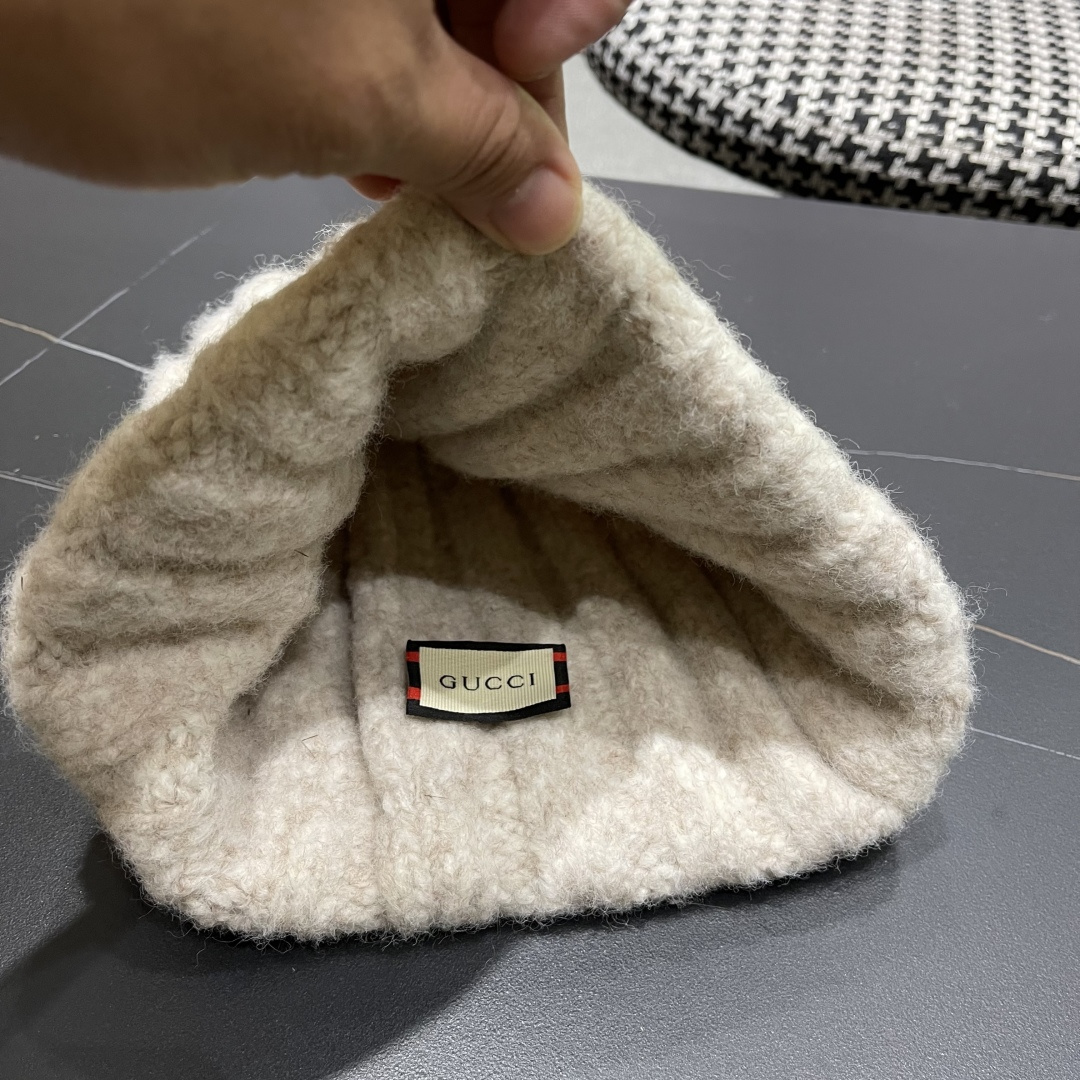 古奇 日系条纹保暖毛线帽子女户外滑雪宽松情侣新款冷帽时尚针织帽