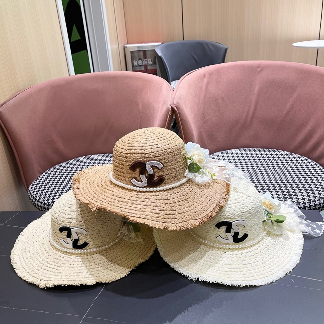  香奈儿Chanel2025新款百搭沙滩帽太阳花女土平顶帽夏天旅游防晒太
阳帽草编帽子