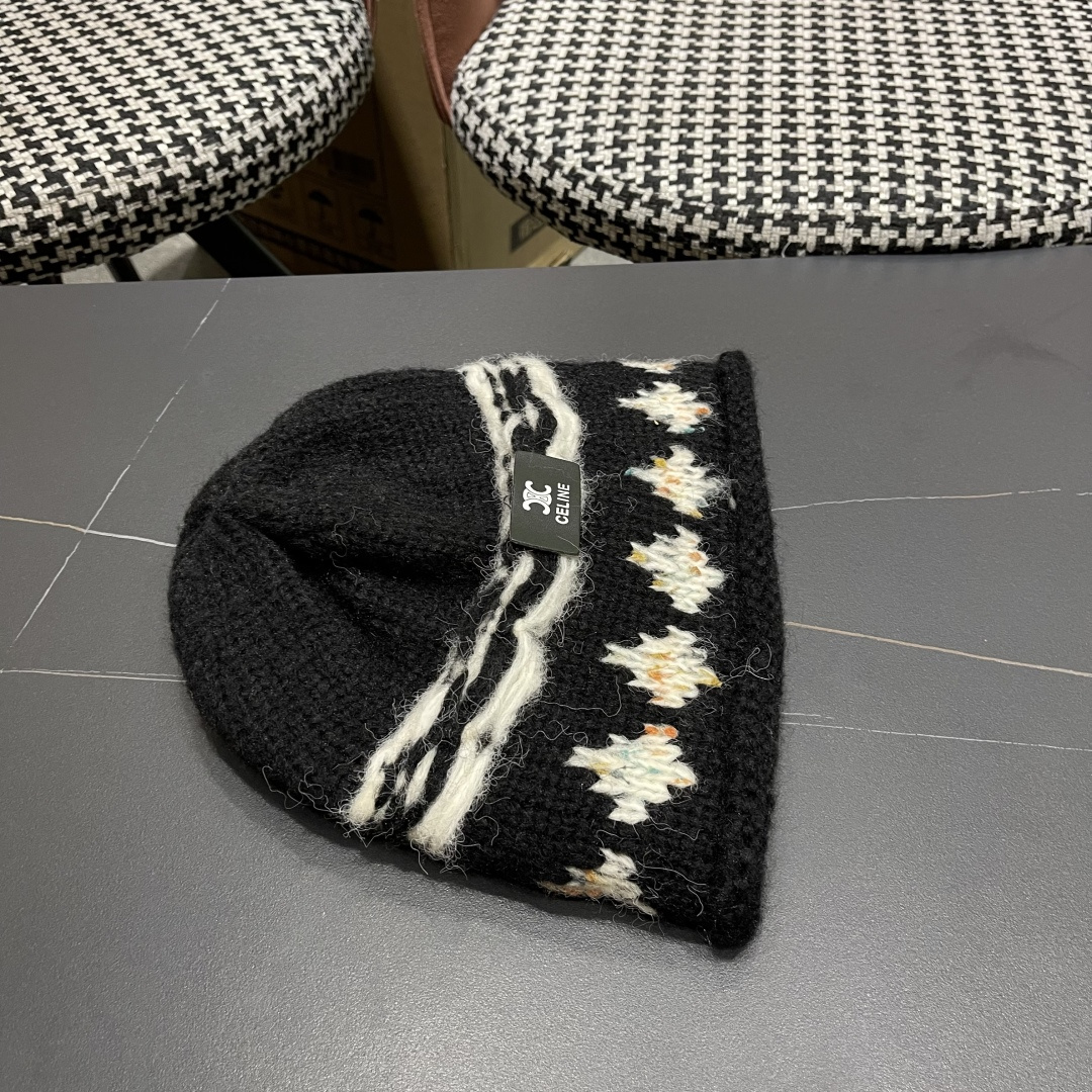  CELINE赛琳 秋冬新款墨调普鲁士蓝包头帽提花自然卷边毛线
帽男女凹造型针织帽