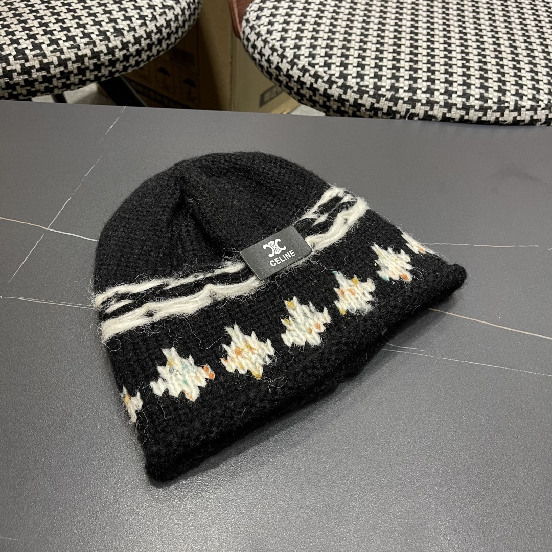  CELINE赛琳 秋冬新款墨调普鲁士蓝包头帽提花自然卷边毛线
帽男女凹造型针织帽