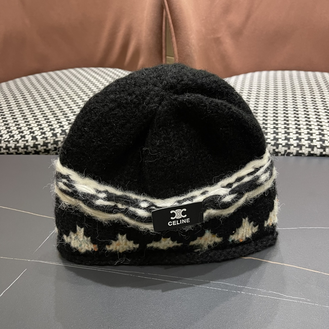  CELINE赛琳 秋冬新款墨调普鲁士蓝包头帽提花自然卷边毛线
帽男女凹造型针织帽