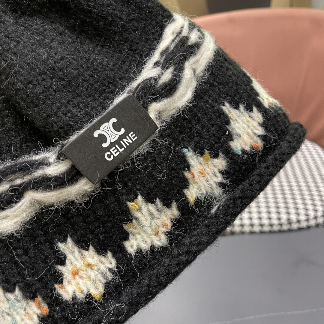  CELINE赛琳 秋冬新款墨调普鲁士蓝包头帽提花自然卷边毛线
帽男女凹造型针织帽