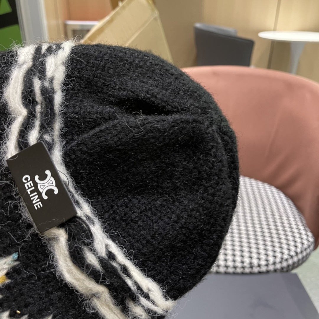  CELINE赛琳 秋冬新款墨调普鲁士蓝包头帽提花自然卷边毛线
帽男女凹造型针织帽