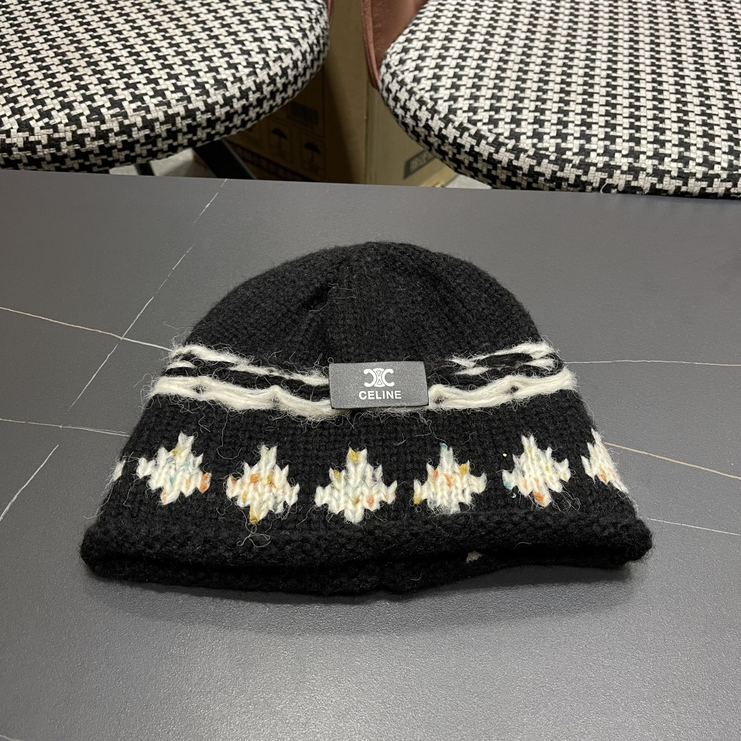  CELINE赛琳 秋冬新款墨调普鲁士蓝包头帽提花自然卷边毛线
帽男女凹造型针织帽