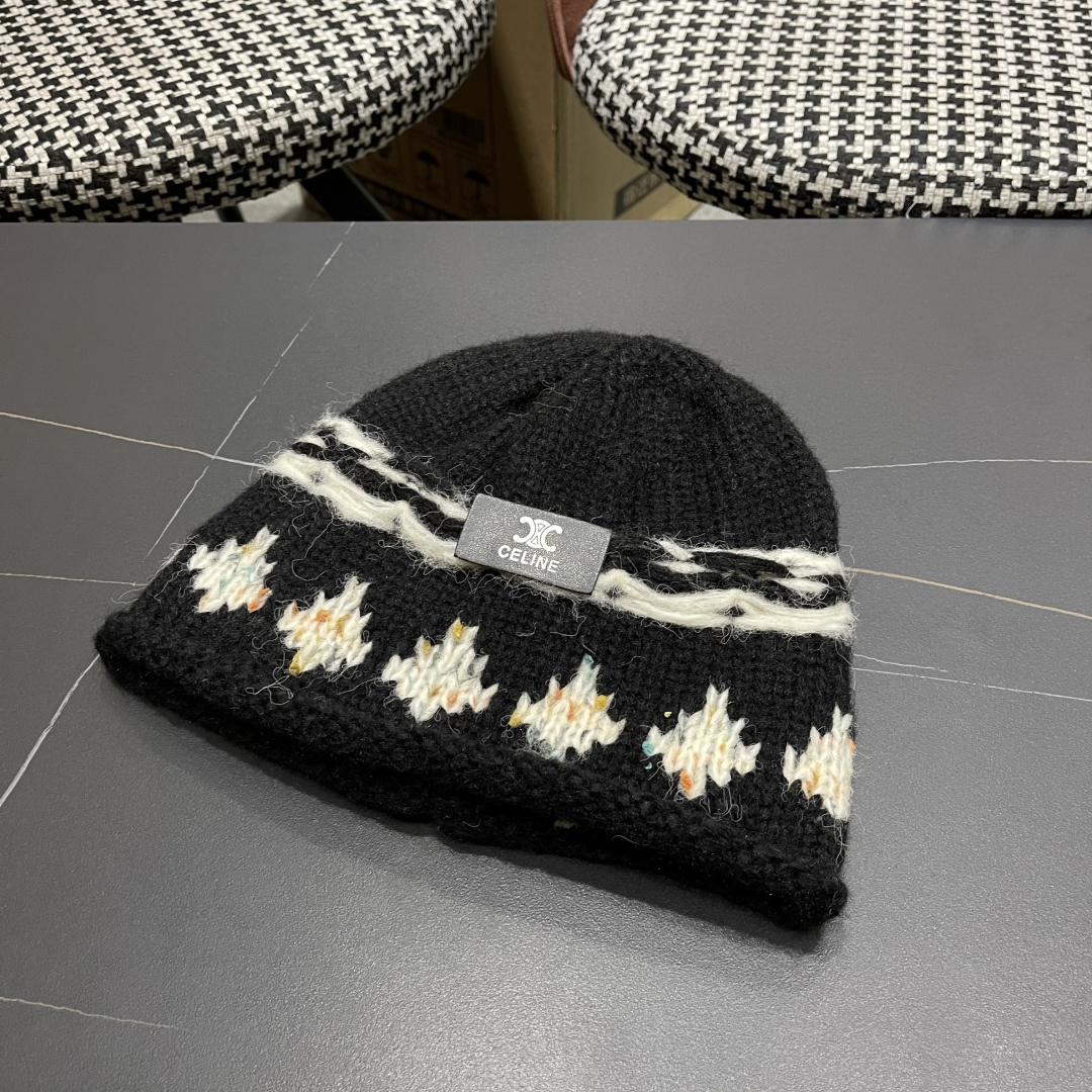  CELINE赛琳 秋冬新款墨调普鲁士蓝包头帽提花自然卷边毛线
帽男女凹造型针织帽