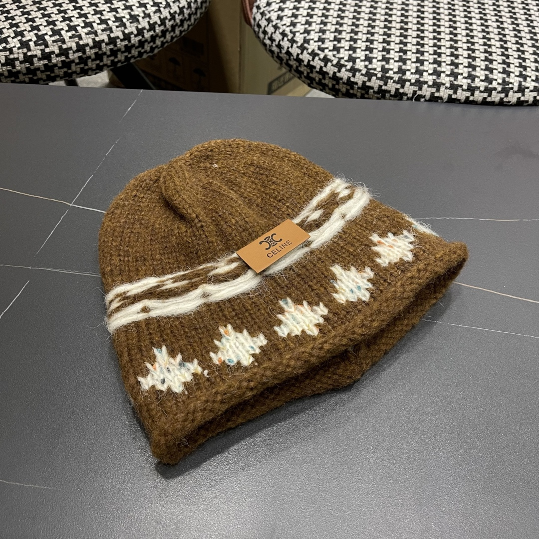  CELINE赛琳 秋冬新款墨调普鲁士蓝包头帽提花自然卷边毛线
帽男女凹造型针织帽