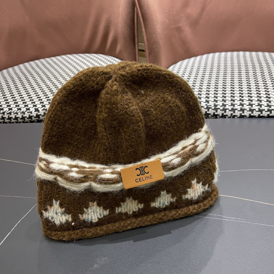  CELINE赛琳 秋冬新款墨调普鲁士蓝包头帽提花自然卷边毛线
帽男女凹造型针织帽