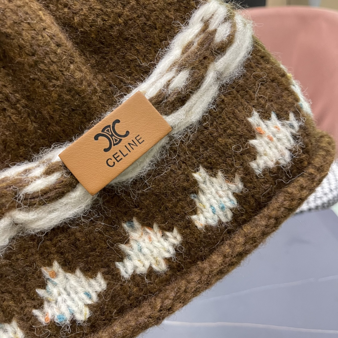  CELINE赛琳 秋冬新款墨调普鲁士蓝包头帽提花自然卷边毛线
帽男女凹造型针织帽