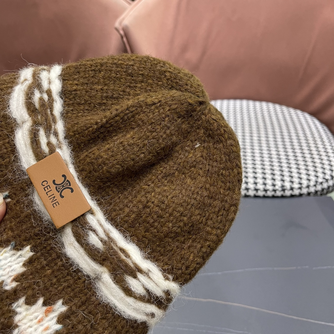  CELINE赛琳 秋冬新款墨调普鲁士蓝包头帽提花自然卷边毛线
帽男女凹造型针织帽