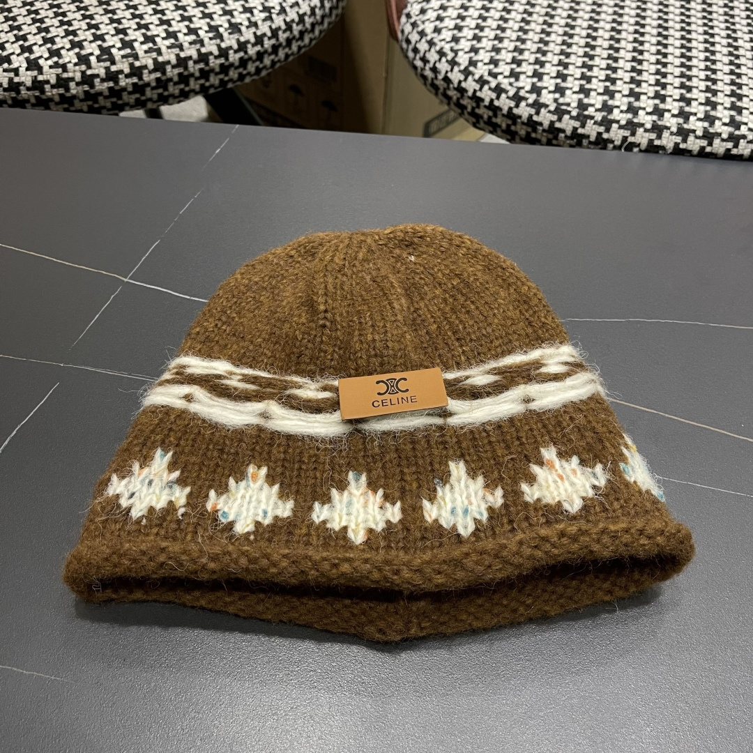  CELINE赛琳 秋冬新款墨调普鲁士蓝包头帽提花自然卷边毛线
帽男女凹造型针织帽