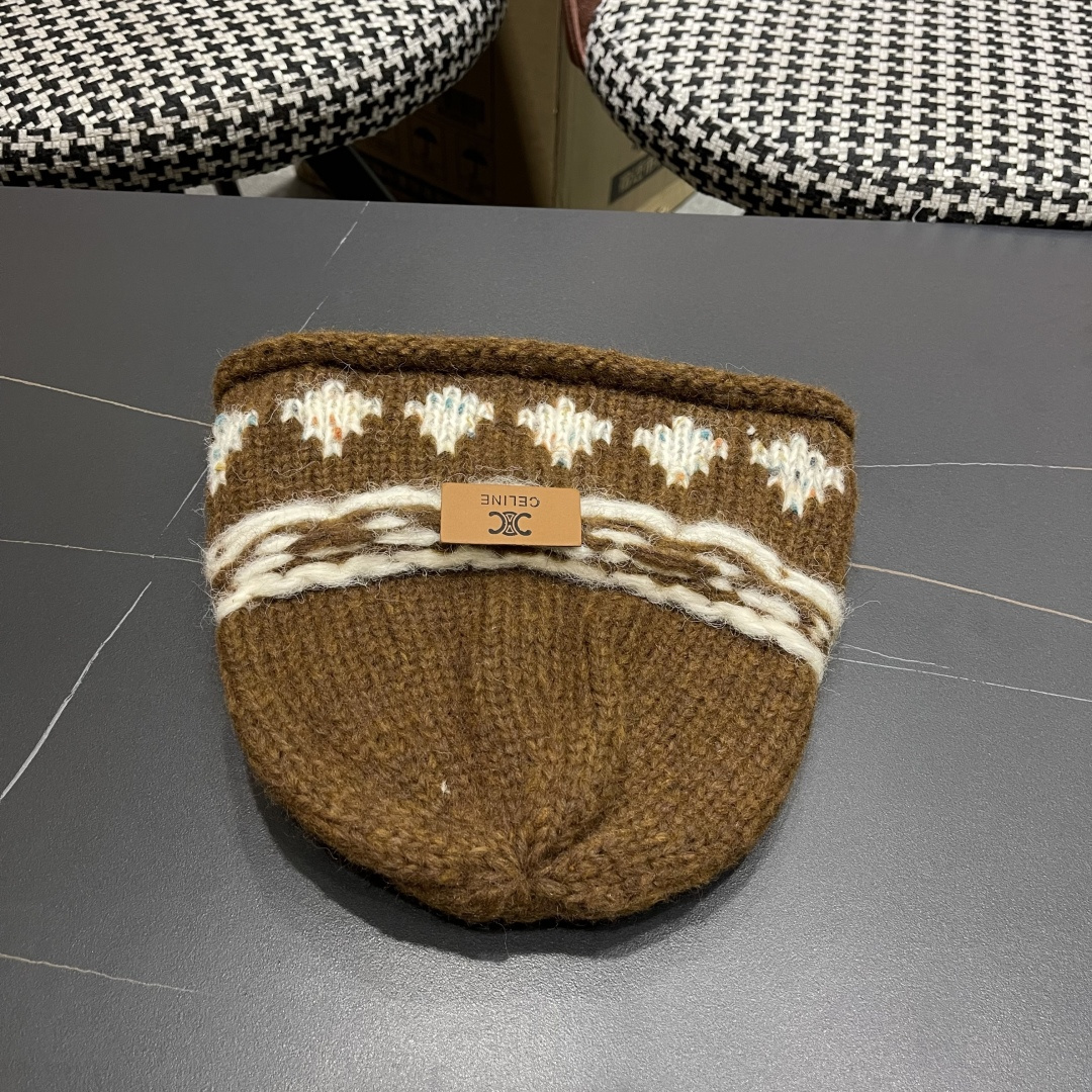  CELINE赛琳 秋冬新款墨调普鲁士蓝包头帽提花自然卷边毛线
帽男女凹造型针织帽