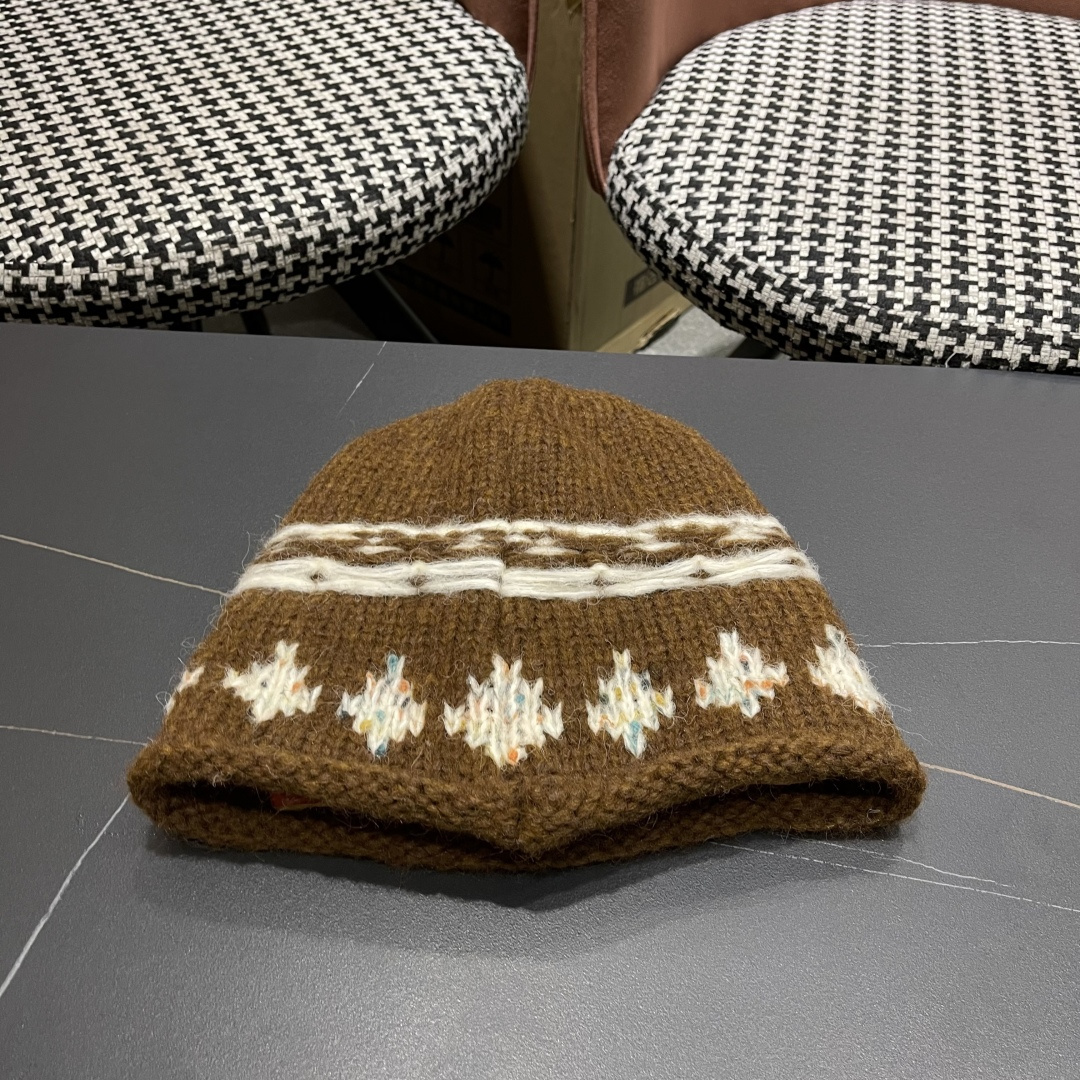  CELINE赛琳 秋冬新款墨调普鲁士蓝包头帽提花自然卷边毛线
帽男女凹造型针织帽