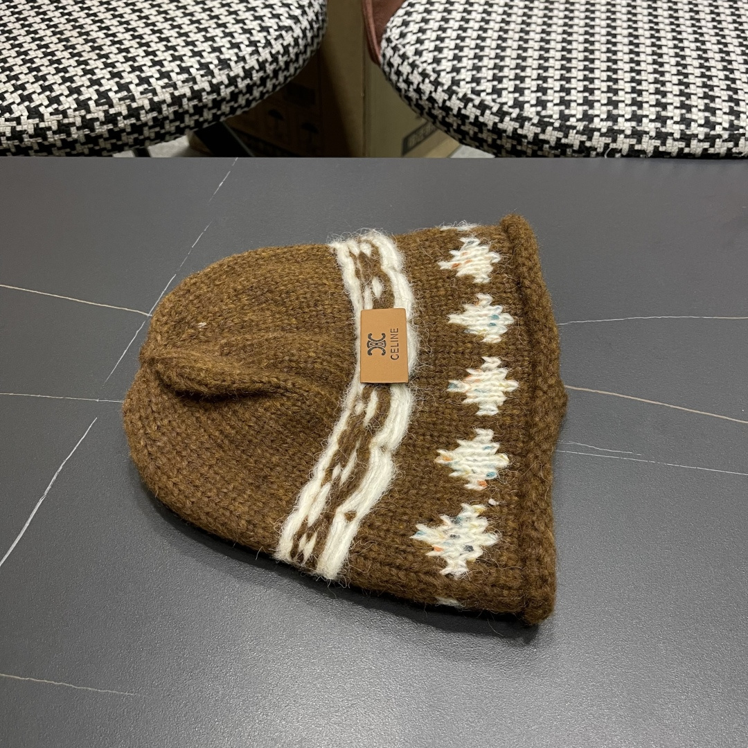  CELINE赛琳 秋冬新款墨调普鲁士蓝包头帽提花自然卷边毛线
帽男女凹造型针织帽