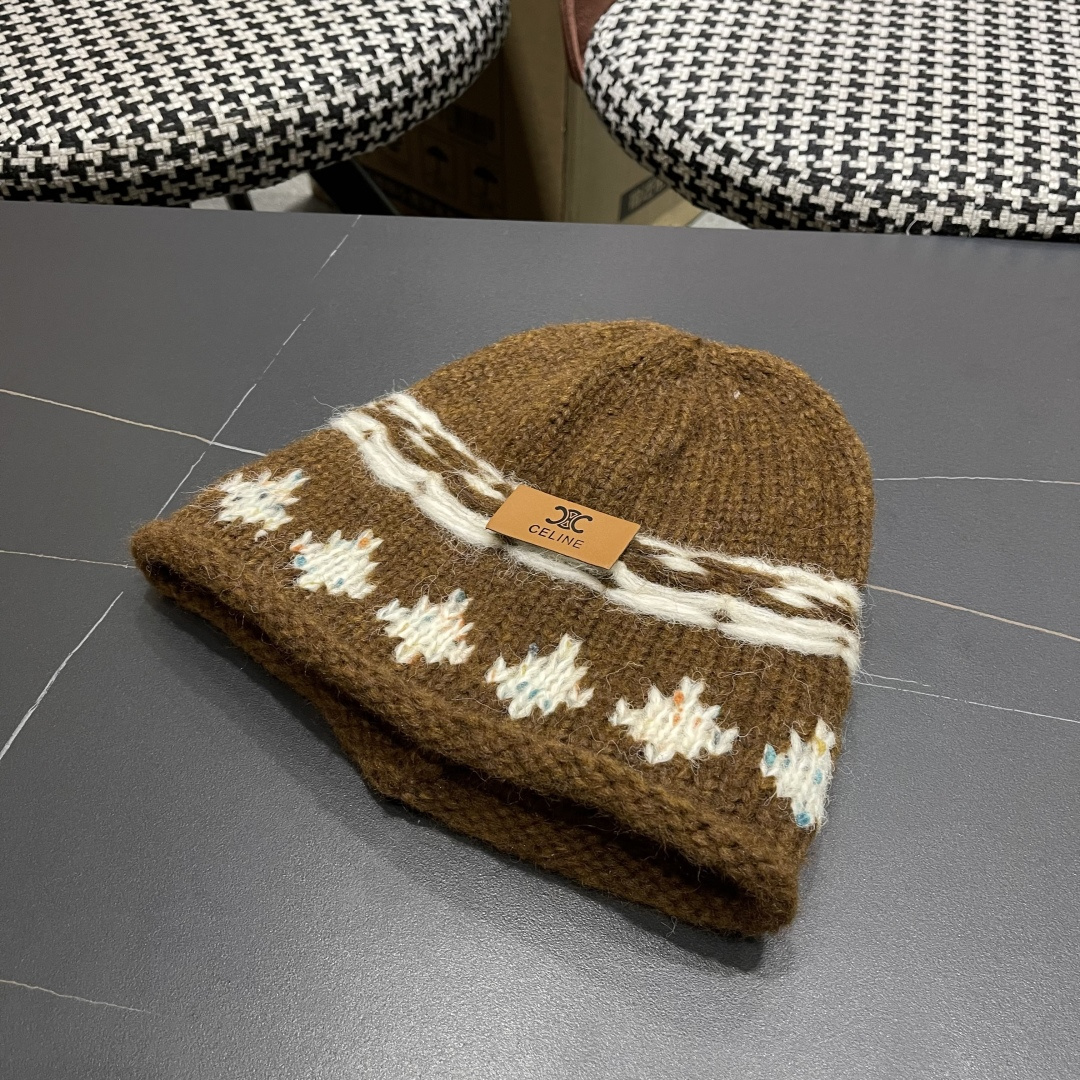  CELINE赛琳 秋冬新款墨调普鲁士蓝包头帽提花自然卷边毛线
帽男女凹造型针织帽