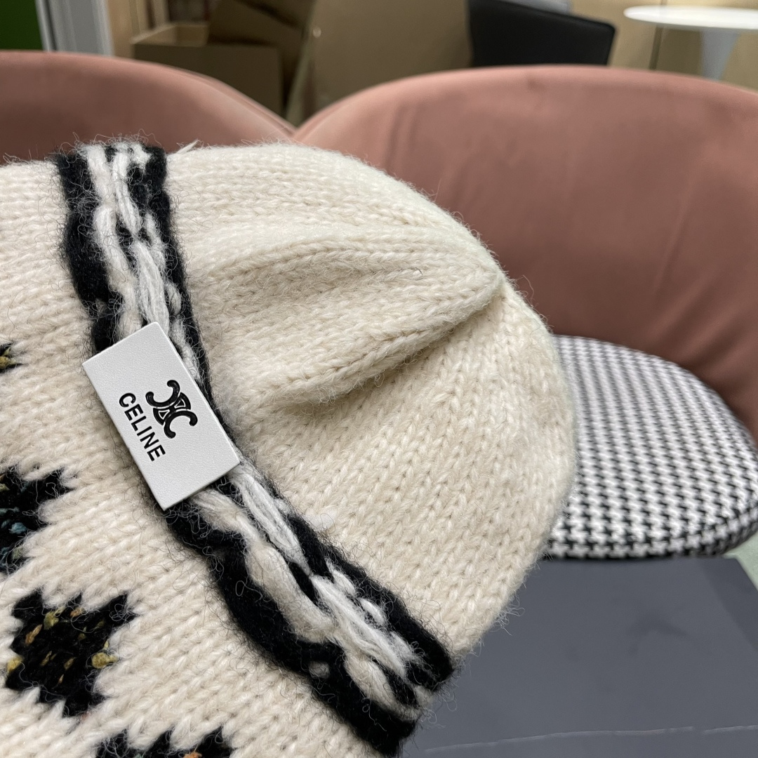  CELINE赛琳 秋冬新款墨调普鲁士蓝包头帽提花自然卷边毛线
帽男女凹造型针织帽