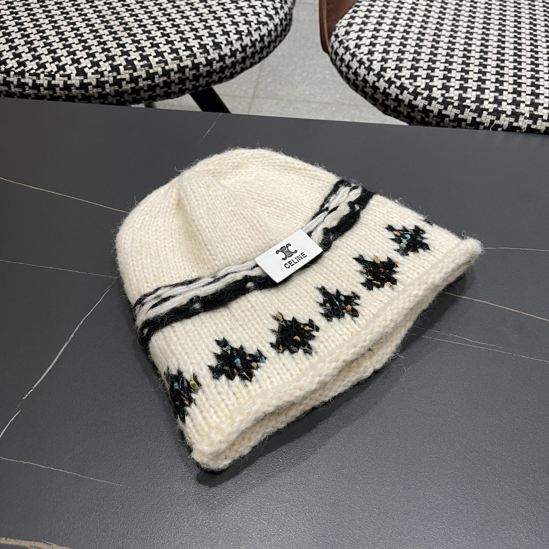  CELINE赛琳 秋冬新款墨调普鲁士蓝包头帽提花自然卷边毛线
帽男女凹造型针织帽