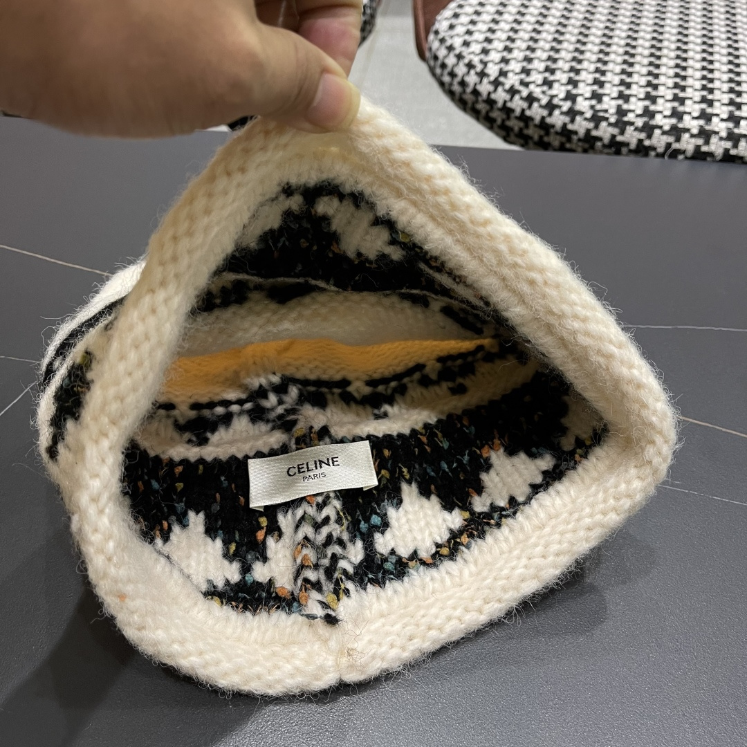  CELINE赛琳 秋冬新款墨调普鲁士蓝包头帽提花自然卷边毛线
帽男女凹造型针织帽