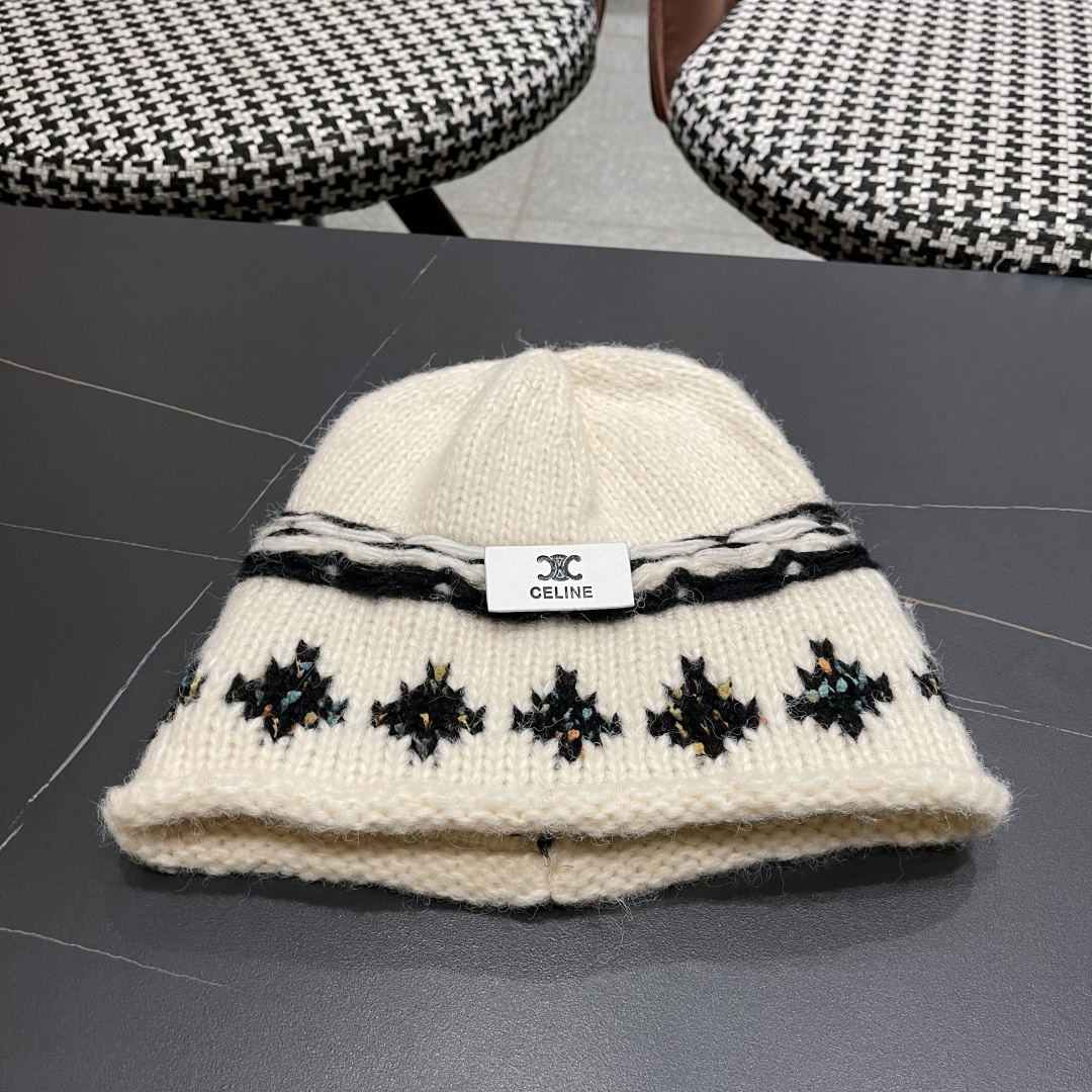  CELINE赛琳 秋冬新款墨调普鲁士蓝包头帽提花自然卷边毛线
帽男女凹造型针织帽