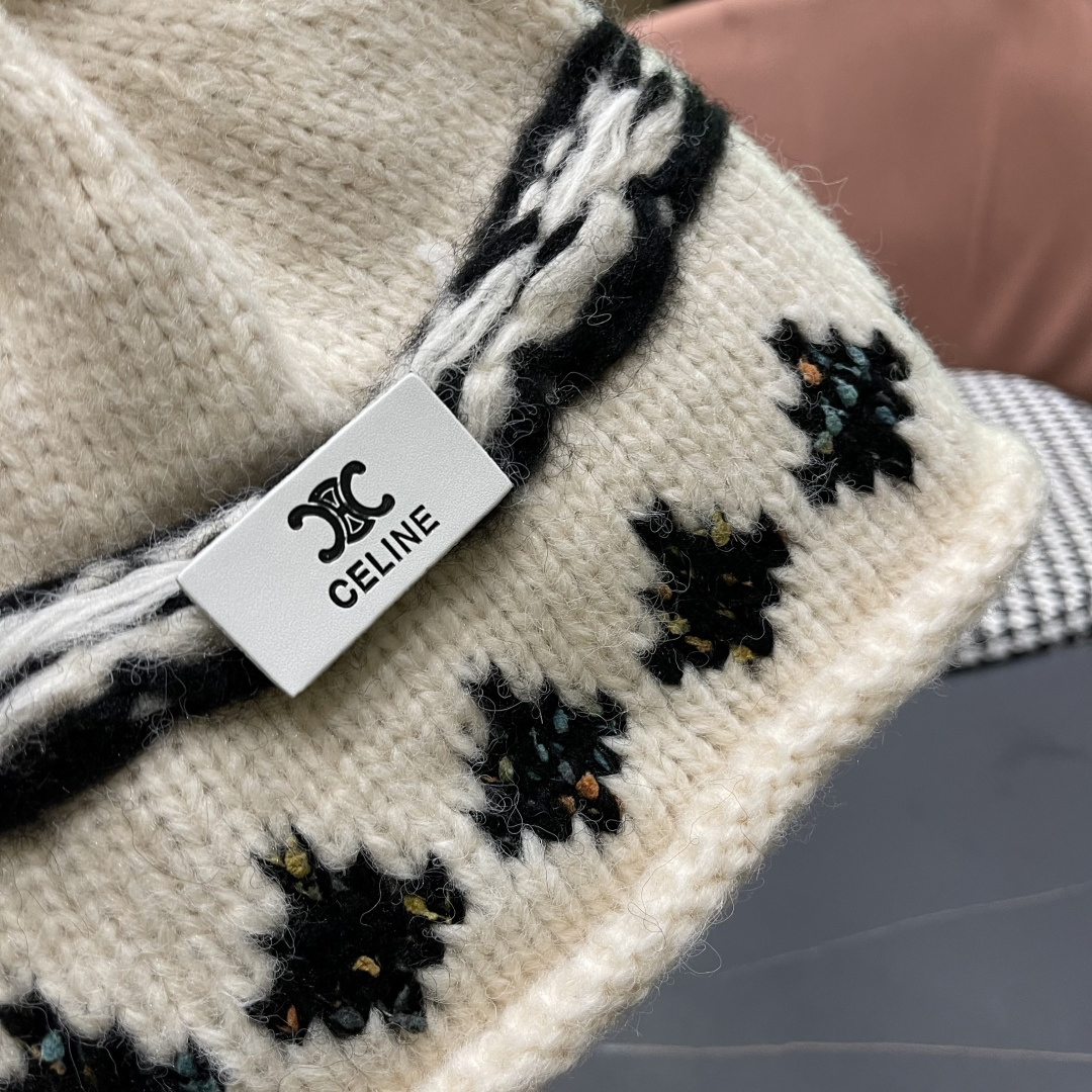  CELINE赛琳 秋冬新款墨调普鲁士蓝包头帽提花自然卷边毛线
帽男女凹造型针织帽