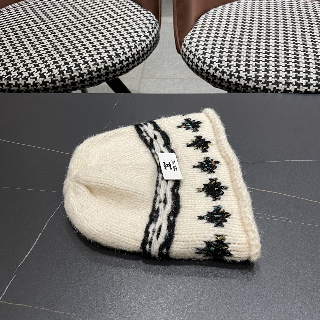  CELINE赛琳 秋冬新款墨调普鲁士蓝包头帽提花自然卷边毛线
帽男女凹造型针织帽