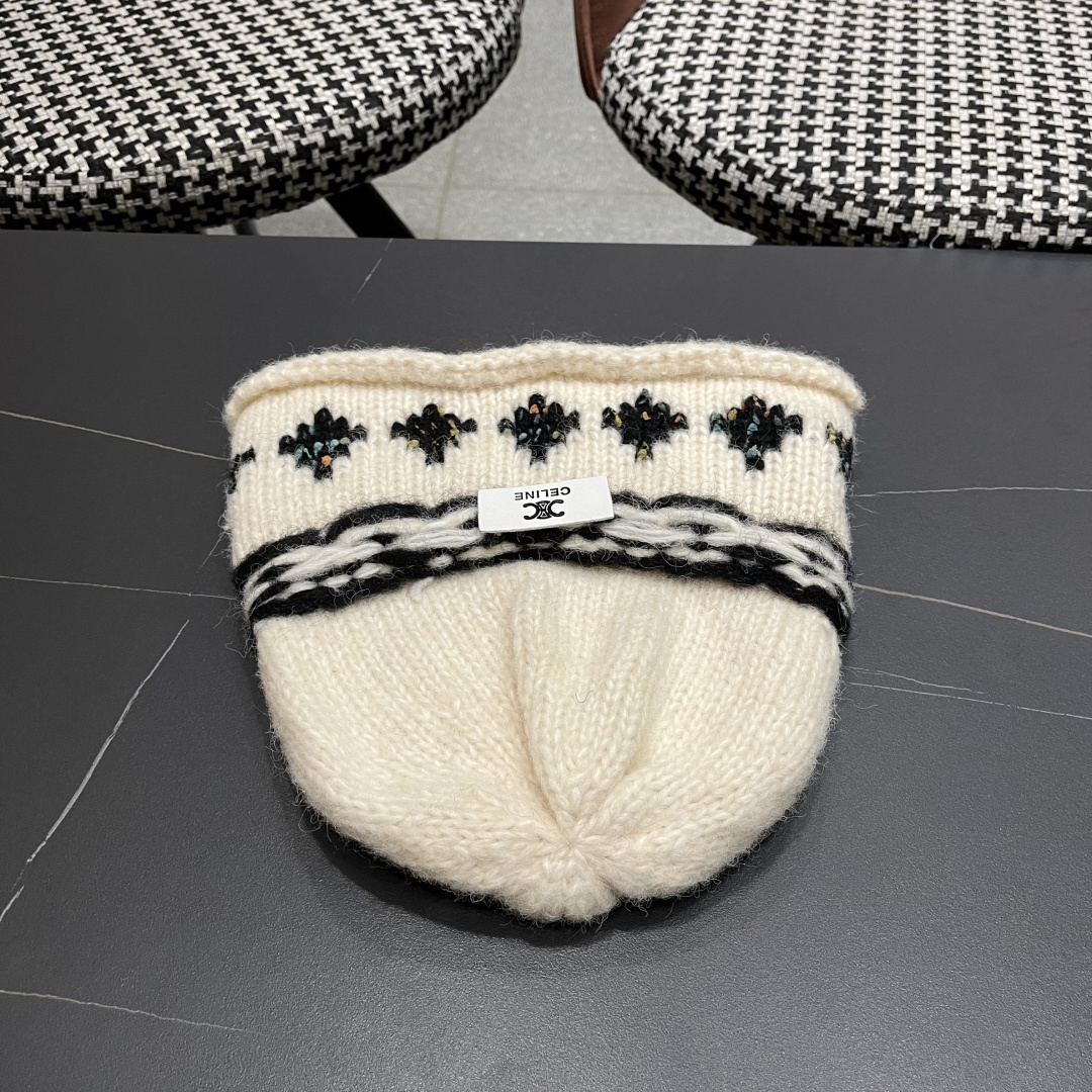  CELINE赛琳 秋冬新款墨调普鲁士蓝包头帽提花自然卷边毛线
帽男女凹造型针织帽